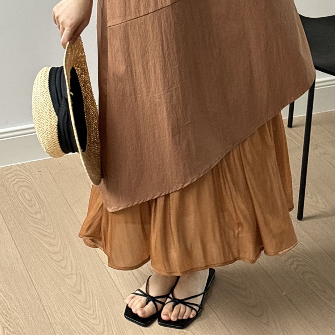Sleeveless Long Dress with Asymmetrical Hem and Panelled Design