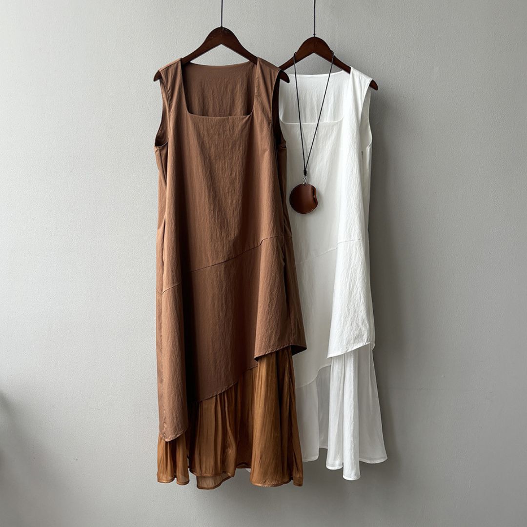 Sleeveless Long Dress with Asymmetrical Hem and Panelled Design