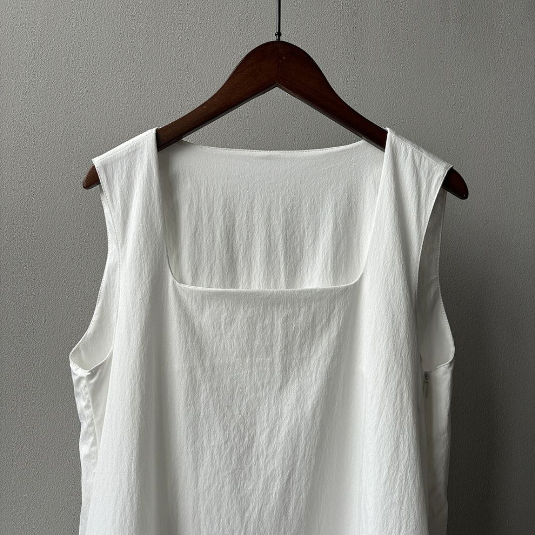 Sleeveless Long Dress with Asymmetrical Hem and Panelled Design