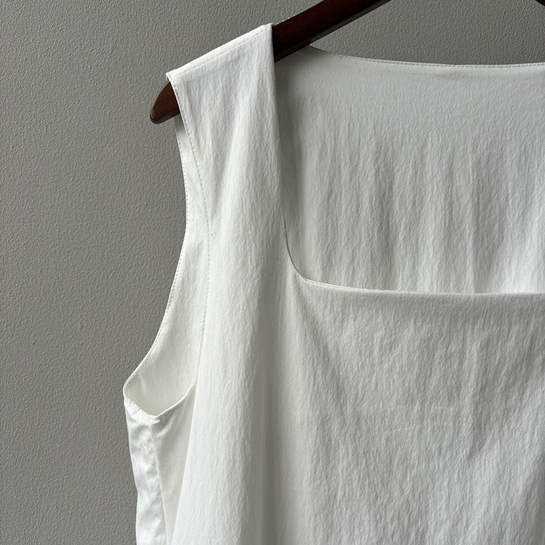 Sleeveless Long Dress with Asymmetrical Hem and Panelled Design