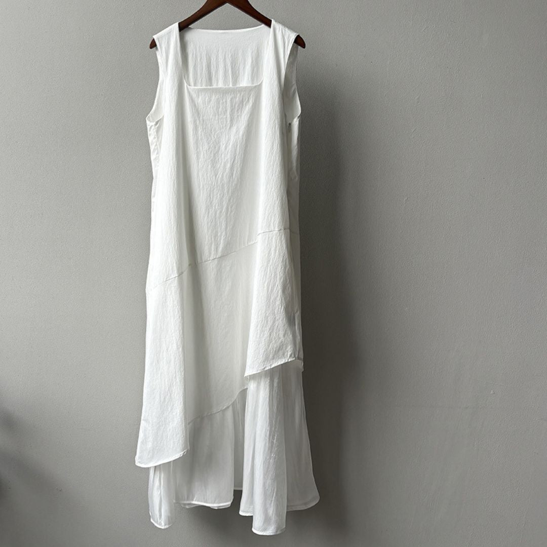 Sleeveless Long Dress with Asymmetrical Hem and Panelled Design