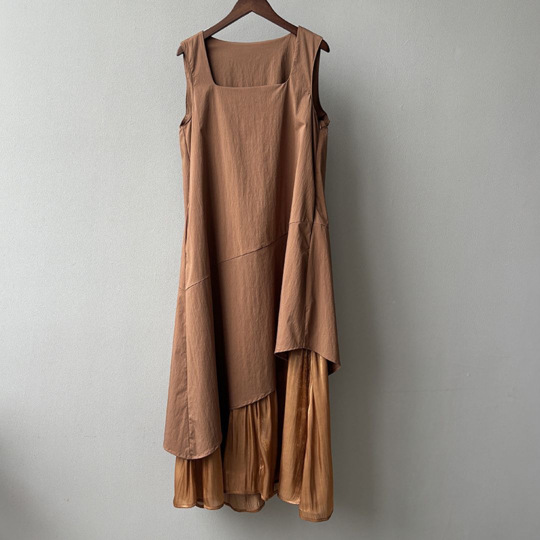 Sleeveless Long Dress with Asymmetrical Hem and Panelled Design