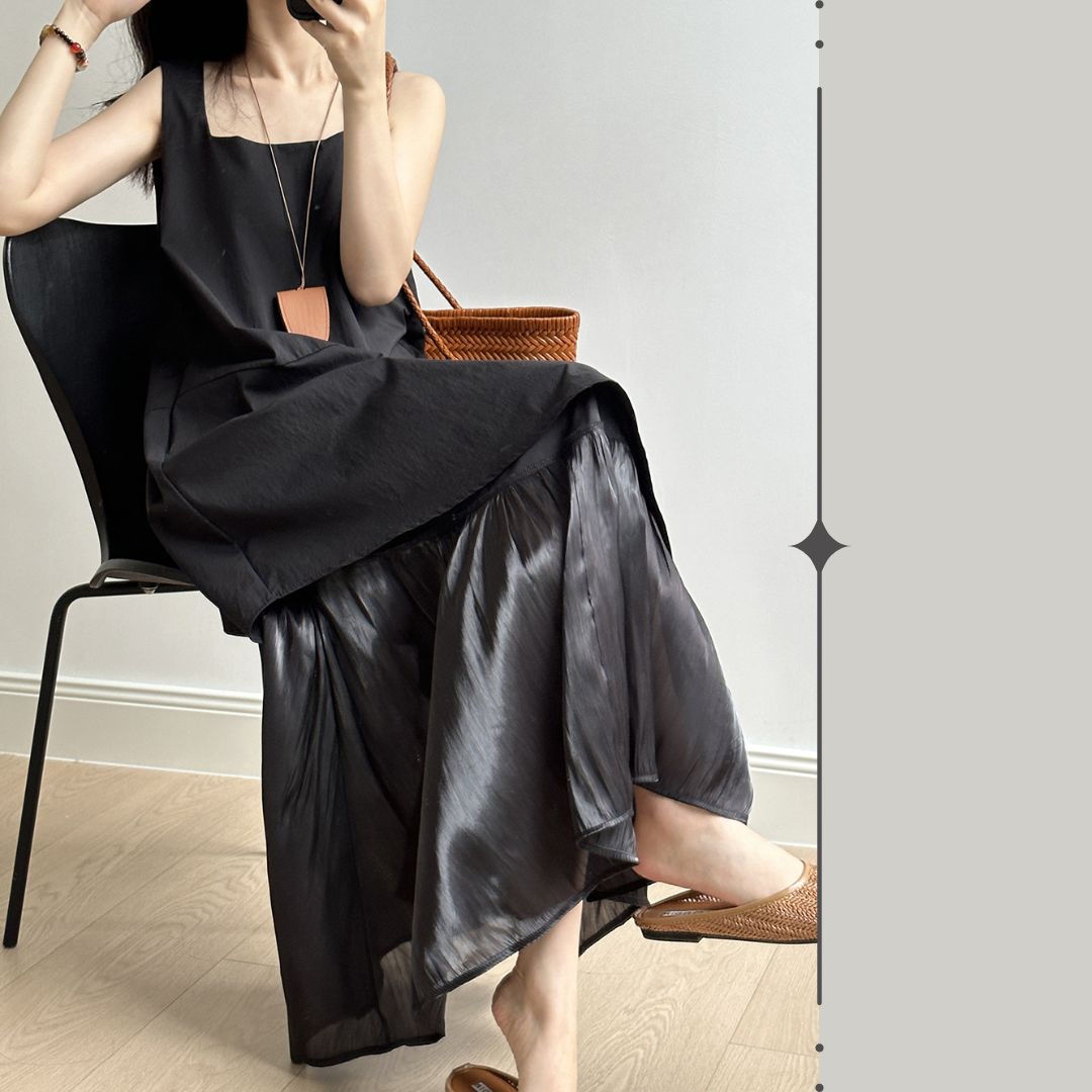 Sleeveless Long Dress with Asymmetrical Hem and Panelled Design