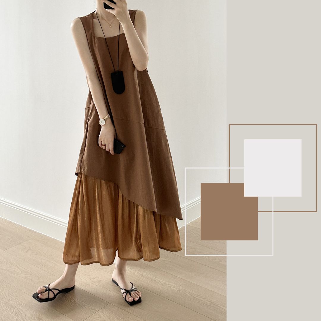 Sleeveless Long Dress with Asymmetrical Hem and Panelled Design