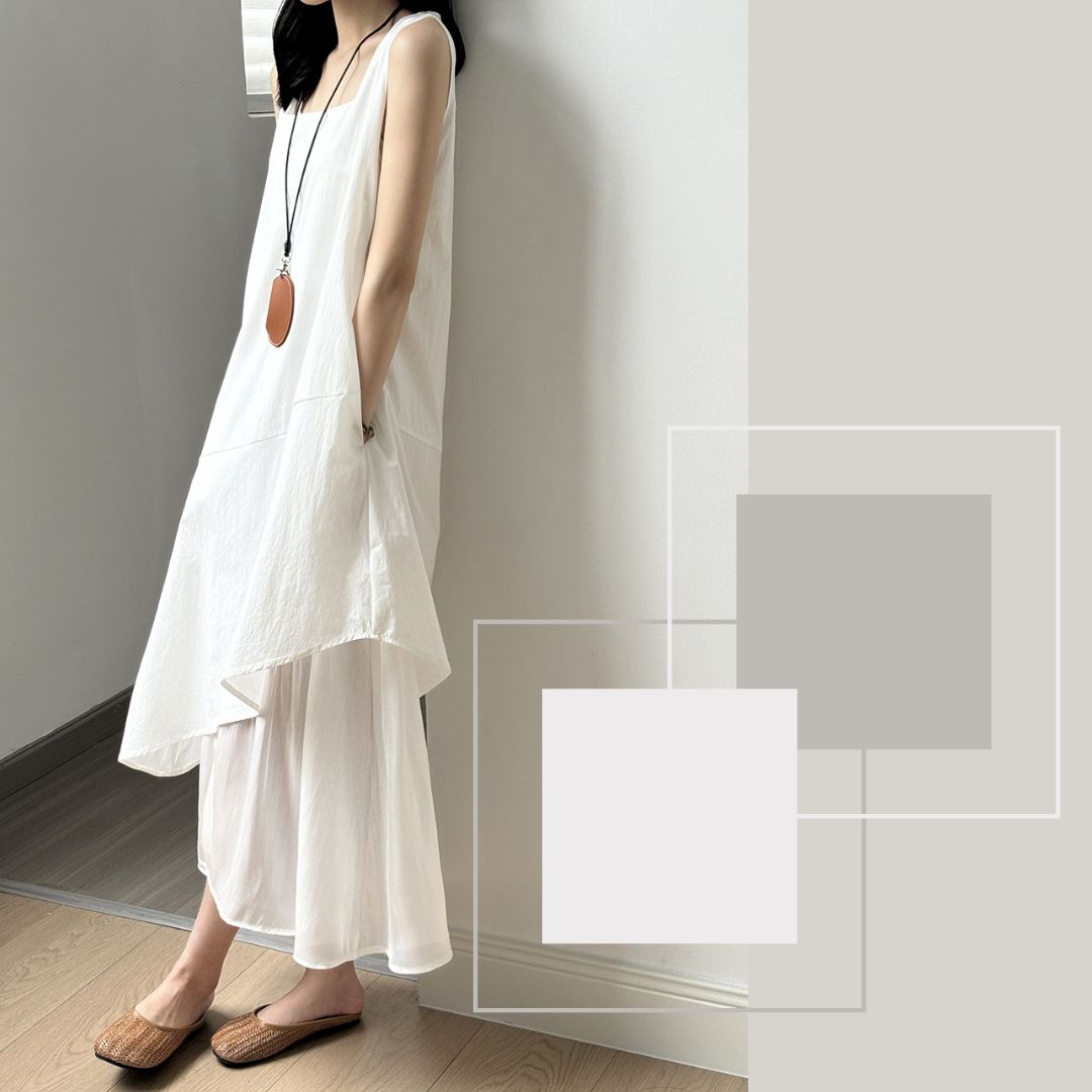 Sleeveless Long Dress with Asymmetrical Hem and Panelled Design