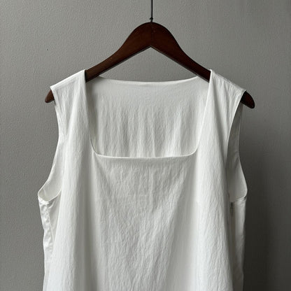 Sleeveless Long Dress with Asymmetrical Hem and Panelled Design
