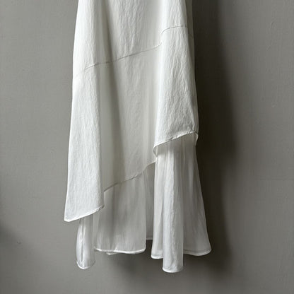 Sleeveless Long Dress with Asymmetrical Hem and Panelled Design
