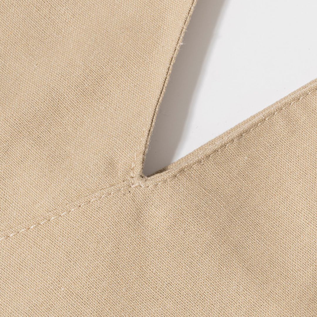 Knotted Triangle Shoulder Bag