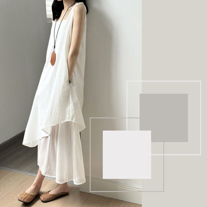 Sleeveless Long Dress with Asymmetrical Hem and Panelled Design