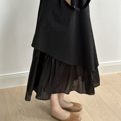 Sleeveless Long Dress with Asymmetrical Hem and Panelled Design